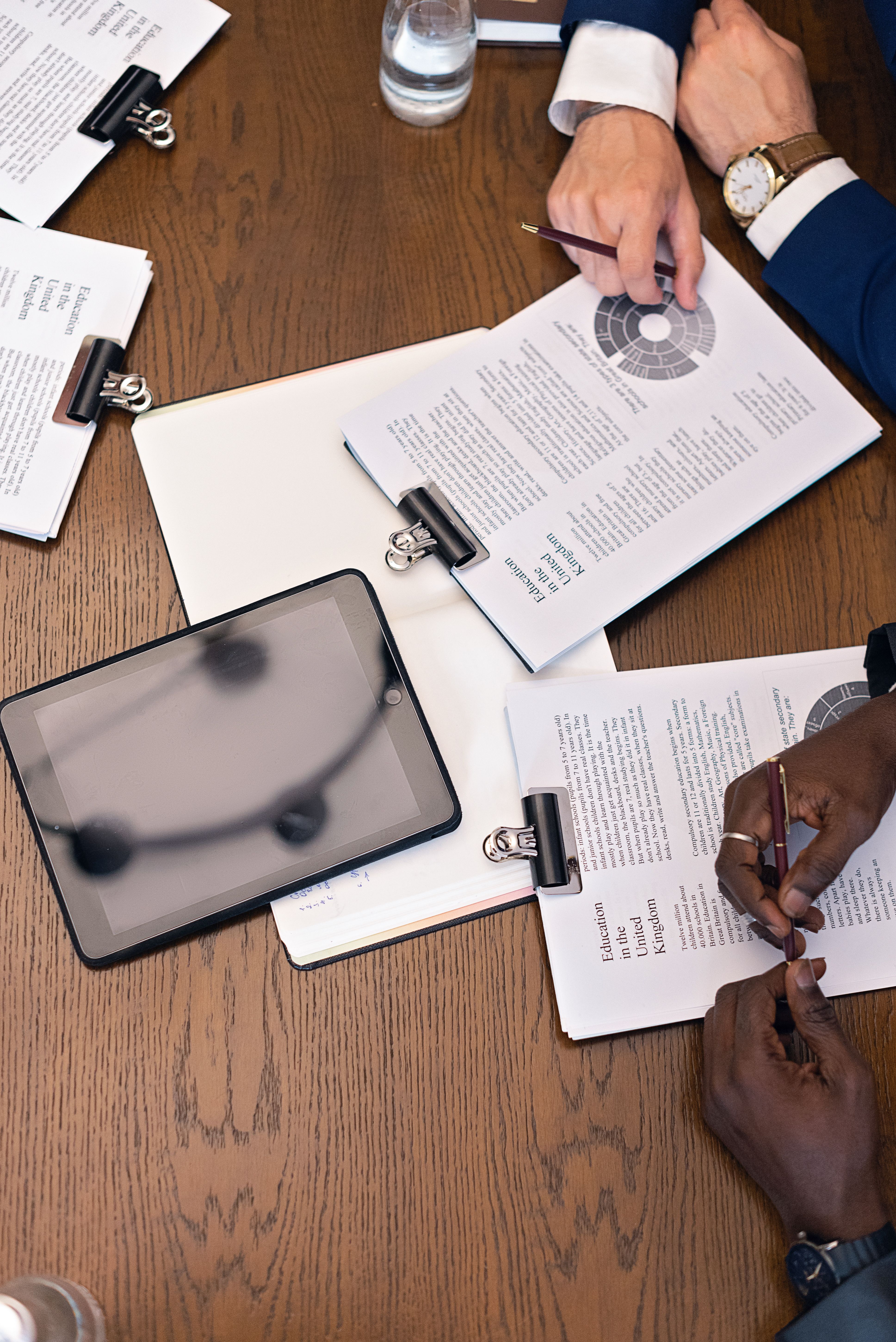 Consultant examining paperwork